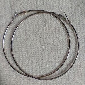 Huge silvertone hoop wire earrings